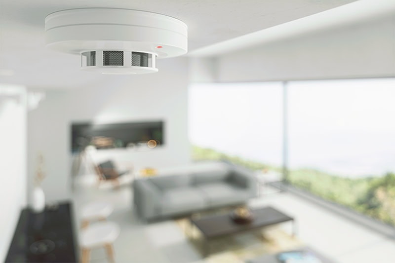 Carbon monoxide detector mounted to ceiling of residential home in Grand Junction, CO, after air duct cleaning service.